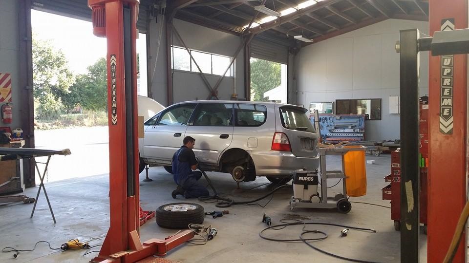 Auto restoration and repainting after collision damage